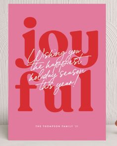 a pink greeting card with the words,'wishing you the happflest holiday season