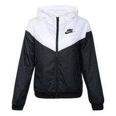 Nike Splicing Sports Hooded Jacket Breathable Black AR3093-010 (Women's) White Windbreaker With Contrast Color For Fall, White Contrast Color Windbreaker For Fall, Sporty White Color Block Windbreaker, Sporty White Nylon Hooded Jacket, Sporty Long Sleeve Windbreaker With Contrast Panels, Black Nylon Outerwear For Light Sports, White Winter Track Jacket With Contrast Color, Hooded Windbreaker With Contrast Color For Winter, White Drawstring Hooded Outerwear For Light Sports