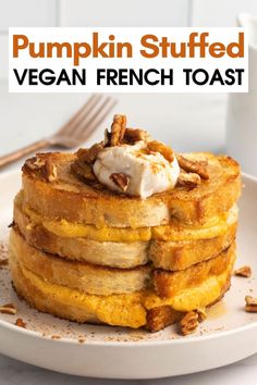 pumpkin stuffed vegan french toast on a white plate with whipped cream and pecans