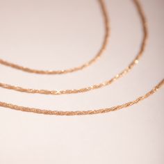 Cut from gold, with the warm touch of a lover�s palm pressed against your own. We�ve been waiting for the exactly just right weightier chain � with shimmer, to hold its own and make all others fall away � and finally, it has arrived. Welcome, the Lover�s Bracelet. Made with 100% recycled solid 14k gold. Rose Gold Diamond Cut Chain Bracelet, Delicate Gold Diamond Cut Bracelets, Elegant Rose Gold Jewelry With Cable Chain, Rose Gold 14k Diamond Cut Bracelet, Rose Gold Snake Chain Jewelry, Gold Wheat Chain Bracelet As Gift, Gold Wheat Chain Bracelet Gift, Timeless Gold Chain Bracelet With Diamond Cut, Rose Gold Diamond Cut Chain Bracelet As Gift