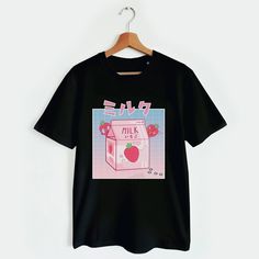 Japanese aesthetic t-shirt, t-shirt for Japan lovers, cute gift for anime fan, fans of the 90s, and manga fans. This shirt is available in 2 different styles / materials: ▪️ Standard Unisex shirt: 100% cotton short-sleeve shirt / Regular Unisex fit / Pre-shrunk to minimize shrinkage / Fabric weight: 4.5-5 oz/y² Brand: Fruit of the Loom High Density shirt or Gildan 64000 ▪️ Premium Ringspun Unisex shirt: Ultra-soft lightweight combed ring-spun 100% cotton short-sleeve shirt / Regular Unisex fit / Kawaii T-shirt With Cartoon Print For Fans, Kawaii Cartoon Print T-shirt For Fans, Pink Harajuku T-shirt With Graphic Design, Kawaii Cotton T-shirt For Streetwear, Kawaii T-shirt With Letter Print For Streetwear, Kawaii Letter Print T-shirt For Streetwear, Cute Graphic Design T-shirt For Streetwear, Y2k Style Anime Print Short Sleeve T-shirt, Kawaii Crew Neck T-shirt For Streetwear