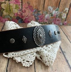 "v'¯) .`*.¸.*' Beautiful RuStiC Wide leather bracelet, with a FeMiNinE flair ❤ This DESIGN ❤~ Handmade leather cuff, hammered, painted black and distressed. This wide black leather cuff holds a beautifully detailed oval silver concho. Small silver rivets compliment the center piece. The width of the cuff is approximately 1 3/4\" wide. BRACELET SIZING INFO: My women's bracelets are approximately 8 1/2 inches end to end. I place 2 snaps at 7 and 7 3/4 inches for adjustability. jewelry for your hea Adjustable Western Leather Bracelet For Festivals, Vintage Adjustable Leather Bracelet With Concho, Adjustable Western Cuff Bracelet For Festivals, Adjustable Western Style Cuff Bracelet For Festivals, Adjustable Western Style Festival Cuff Bracelet, Western Style Adjustable Cuff Bracelet For Festivals, Adjustable Concho Cuff Bracelet For Festival, Adjustable Black Leather Belt Bracelet, Black Bohemian Leather Bracelet