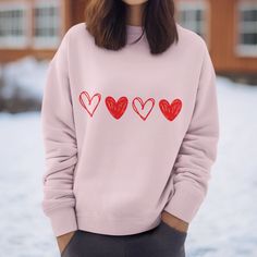 "Introducing our valentines sweatshirt - A Must-Have Addition to Your Wardrobe! Experience the ultimate in cozy comfort with our specially crafted sweatshirt. Designed with your utmost comfort in mind, this sweatshirt is perfect for those who appreciate quality, style, and functionality. 🌟 Key Features 🌟 🔹 Seamless Perfection: Say goodbye to irritating side seams, ensuring a smooth and comfortable fit all day long. 🔹 Ribbed Knit Collar: The ribbed knit collar not only adds a touch of sophistication but also provides extra durability. It's the perfect blend of style and substance. 🔹 Premium Materials: Made from a blend of 50% cotton and 50% polyester, our sweatshirt offers the ideal combination of softness and durability. 🌬️ Easy Care Instructions 🌬️ ✅ Machine Wash: Cold water is all Valentine's Day Casual Hoodie With Letter Print, Oversized Crew Neck Sweater With Heart Print, Heart-shaped Cotton Winter Top, Cotton Heart-shaped Top For Winter, Pink Crew Neck Sweater With Heart Graphic, Casual Pink Heart-shaped Sweater, Cute Sweatshirt With Heart Graphic And Crew Neck, Cute Crew Neck Sweatshirt With Heart Graphic, Casual Sweatshirt With Heart-shaped Graphic Print