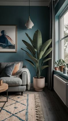 a living room filled with furniture and a potted plant