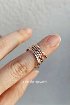 Explore our collection of 14k gold-filled rings, featuring minimalist and dainty styles that are modern, personalized, and perfect for stacking. Hypoallergenic and water-resistant, these stylish rings offer everyday elegance with lasting quality. Minimalist Stacked Rings As Gift, Dainty Stacked Rings As A Gift, Minimalist Stacked Rings Gift, Minimalist Stacked Midi Rings As Gift, Minimalist Stacked Midi Rings For Promise, Minimalist Stacked Rings For Anniversary, Stacked Minimalist Midi Rings, Minimalist Stacked Anniversary Rings, Everyday Hypoallergenic 14k Gold Stackable Rings