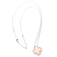 Van Cleef & Arpels Alhambra 18k White Gold Pink Opal Pendant Necklace       Metal: 18k white gold  Length: 16.75", 15"  Weight: 5.5 grams  Stones: 1 alhambra shape pink opal 15mm  Hallmarks: VCA 750 BL68XXX(serial number omitted)  Please reference the dimensions in the description for the best approximate dimensions. Luxury Hallmarked Rose Gold Diamond Necklace, Luxury Silver Chain Jewelry For Weddings, Luxury White Gold Diamond Necklace With Clavicle Chain, Luxury White Diamond Necklace With Polished Finish, Luxury Hallmarked White Gold Diamond Necklace, Luxury White Diamond Necklace With Flower Pendant, Luxury White Necklace With Silver Chain, Luxury Pink Diamond Necklace, Luxury Formal Diamond Necklace With Silver Chain