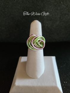 Hello & Welcome! In this listing you will find a very pretty, handcrafted aluminum wire wrapped ring. Size 7 Made using 16 gauge baby pink & lime green aluminum wire & lot's of love. It is non-adjustable & is true to size. You will receive the exact ring that is shown in the photos. Free gift wrapping is available. If you're sending the ring as a gift, please mark the gift option or leave me a note in the "notes" section during checkout. If you have any questions, feel free to send me a message & I'll be happy to assist you. Thanks for taking a look & have yourself a beautiful day!♥ Saint Ann, Wire Wrapped Ring, Wire Wrapped Rings, Wrap Rings, A Beautiful Day, Free Gift Wrapping, Ring Size 7, Rings Statement, Free Gift