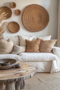 20 Stunning Living Room Wall Decor Ideas Wall Space Filler Ideas, Large Round Wall Decor, Decor Ideas For Large Wall Spaces, Basket Walls Boho Living Room, Basket Walls Boho, Pottery Barn Inspired Living Room, Basket Walls, Rattan Wall Decor