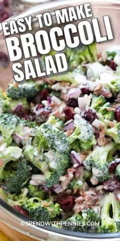 broccoli salad with cranberries and onions in a glass bowl on a wooden table