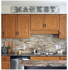 a kitchen with wooden cabinets and granite counter tops