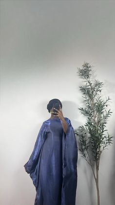 Shiny Butterfly Dress with a sewed in belt, you can decide to tie the belt or wear it loose for a more modest fit. Woman Butterfly, Butterfly Abaya, Shiny Butterfly, Purple Bridesmaids, Modest Fits, Fake Piercing, Abaya Dress, Grad Dresses, Butterfly Dress