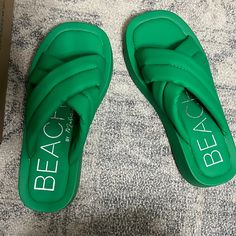 New In Box. Cute, Kelly Green! So Comfy! Padded Strap! Trendy Green Flip Flops For Vacation, Trendy Green Flip Flops For Beach Season, Green Synthetic Slides For The Beach, Green Eva Flip Flops For Vacation, Summer Slide Wedge Sandals In Synthetic Material, Green Eva Sandals For The Beach, Green Eva Sandals For Beach, Green Slip-on Wedge Sandals For Vacation, Green Slip-on Wedge Sandals For Beach