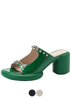 The Vicenta Women's Rivet Patent Leather Sandals by USS Shoes are crafted with genuine leather for a modern and stylish look. Featuring a slip-on closure and open-side vamp, these sandals are perfect for casual occasions. The round heel measures 3 inches for added comfort. Upgrade your footwear collection with these elegant sandals. Green Open Toe Formal Mules, Green Open Toe Leather Mules, Green Leather Open Toe Mules, Formal Open Toe Slippers For Summer, Trendy Patent Leather Sandals With Block Heel, Trendy Closed Toe Patent Leather Sandals, Modern Slip-on Sandals For Party, Modern Patent Leather Slip-on Sandals, Modern Green Open Toe Mules