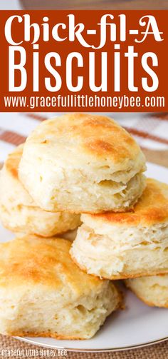 three biscuits stacked on top of each other with the words chicken - in - a - biscuits above them