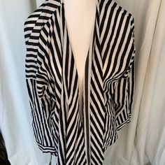 Black And White Striped Open Cardigan-Wrap Chic Striped Cardigan For Spring, Spring Striped Workwear Cardigan, Chic Spring Wrap Outerwear, Chic Wrap Outerwear For Spring, Spring Wrap Cardigan For Daywear, Spring Striped Outerwear For Layering, Black Open Front Tops For Work, Spring Faux Wrap Cardigan, Black Open Front Top For Work