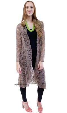 Open duster-style cardigan in beautiful vintage lace with long sleeves and open front. This ladies duster will dress up the most basic outfit and is delicate enough to wear for spring or a black tie event. Available in 3 colors.