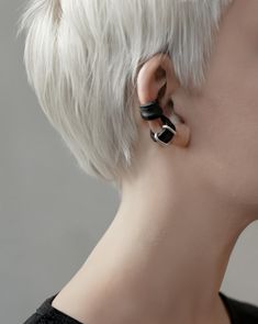 The Rannka adjustable earring leather cuff is a versatile unisex accessory featuring black leather and metal wrap. It's the perfect alternative jewelry ear cuff for a friend as a surprise gift.  𝐒𝐈𝐙𝐄: ➤ 100% adjustable Because of its wire construction - it easily bends and wraps to form any shape or size.  𝐃𝐄𝐓𝐀𝐈𝐋𝐒: ➤ Material: Faux Leather, Mixed Metal Nickel Free, Lead-Free & Hypoallergenic, Non-Tarnish ➤ Choose from Two Designs: With and Without Metal Ring ★ Sold as ONE earring ★ ➤ Ready to Ship -Strong, lightweight, and flexible. Simply wrap it around the desired spot on your ear. -Comes in two design choices: The first option features a sleek bare black faux leather design, while the second option includes metal rings for added flair.  𝐇𝐎𝐖 𝐓𝐎 𝐖𝐄𝐀𝐑 𝐈𝐓 The earring c Elegant Punk, Long Leather Necklace, Punk Looks, Minimalist Earring, Jewelry Ear, Unisex Earrings, Second Option, Alternative Jewelry, Wrap Earrings