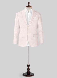 Get ready for summer fun with our Roman Light Pink Linen Boys Suit. Crafted from premium linen, this charming suit is perfect for boys and features a stylish two-button jacket that is both elegant and comfortable. Ideal for any formal event, this suit comes in a delightful light pink color that adds a touch of sophistication. Whether it's a beach wedding, dinner party, or a day out on a yacht, this suit ensures your little one looks his best while feeling great.  Look Includes    Roman     Light     Pink     Linen  Fabric  Two Button Jacket Style  Notch Lapel    Corozo   Beige  Buttons  Single Vent  Three Cuff Buttons  Two Welted Back Pockets on Trousers    Click 'Customize Now' to modify the look if needed.   Lining: Viscose; Dry Clean. Summer Suit With Single Button And Notch Lapel, Semi-formal Summer Suit With Lapel Collar, Formal Summer Suits, Classic Pink Summer Blazer, Classic Summer Suits For Semi-formal Occasions, Business Casual Notch Lapel Suits For Summer, Summer Business Casual Suits With Notch Lapel, Formal Pink Summer Blazer, Single Breasted Suits For Business Casual In Summer