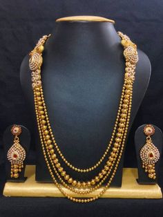 Traditional haram jewelry set in high gold polish with red stones Rani Haar, Red Stones, Real Gold Jewelry, Wedding Jewellery Collection, Gold Jewelry Sets, Bridal Gold Jewellery Designs, Gold Jewelry Indian, Gold Necklace Designs, Neck Piece