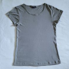 Brand New With Tags Splendidbasic Gray Slim Fit Tee Excellent Condition With No Flaws Size Large Approx Measurements Laying Flat: Length 24" Armpit To Armpit 17.5" Across Bottom Hem 18" 50% Micro Modal 50% Supima Cotton Color Is Medium Gray Slim Fit With Stretch, Rounded Neckline, Straight Hem, Short Sleeves, Lightweight, Soft And Comfortable Material Please No Trades Or Lowballs! *Ask Any Questions You May Have Prior To Making An Offer Please* Basic Solid Color Scoop Neck T-shirt, Fitted Basic Scoop Neck Top, Fitted Scoop Neck Basic Top, Solid Fitted Basic Tops, Basic Fitted Solid Color Tops, Fitted Basic Solid Tops, Basic Solid Fitted Tops, Basic Stretch Plain Tops, Basic Scoop Neck Tops