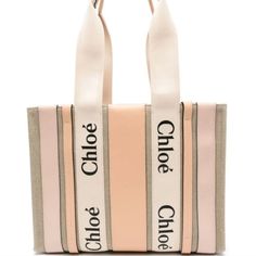 Nwt Chloe Pink Woody Medium Linen Tote Bag. Comes With Dustbag. Light Pink And Ecru Made From Linen Canvas Two Top Handles Open Top Leather Trims Logo-Print Woody Ribbons Internal Slip Pocket Unlined Made In Italy Depth: 4.3 In Handle: 10.2 In Height: 10.6 In Width: 14.2 In Chic Canvas Shoulder Bag With Logo, Designer Beige Bags With Logo Strap, Chic Canvas Bags With Branded Hardware, Pink Leather Bag With Logo, Chic Cream Bags With Logo, Pink Canvas Bag With Leather Handles, Designer Pink Bag With Logo, Chic Canvas Bags With Logo, Designer Pink Shoulder Bag With Logo