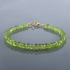 "Gemstone : Green Peridot Handmade bracelet Gemstone Color : Green Gemstone Size : 3-5MM Approx. Gemstone Shape : Rondelle Gemstone Finish : Faceted Stone Beads : 18CM Silver Lock : 8MM Total Length Of bracelet 20CM Can be Personalized : Yes Carat Weight : Approx. 40 carat Materials : 925 Sterling Silver Plating : Yellow Gold Plating, Rose Gold ,Silver Plating All of my jewelry is designed and handcrafted by me. I love to experiment with many different designs and although I may make similar designs more than once, each piece of jewelry is truly one of a kind due to variations between gemstones and within my own craft work. All my jewelry is carefully packed So it ready for gift giving, whether it is a gift for you or someone special. Treatment : 100% Natural Free Customization Available /