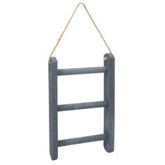 a blue wooden ladder hanging from a rope