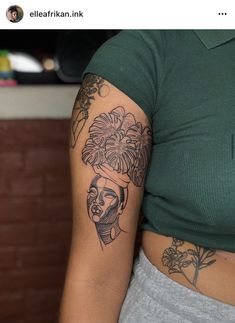 a woman with a tattoo on her arm