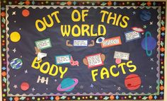 a bulletin board that says out of this world, body fats and has planets on it