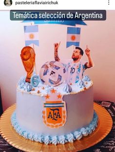 there is a cake that has been decorated to look like a soccer player on it