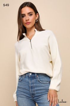 The ultimate fall wardrobe just wouldn't be complete without a go-to sweater like the Lulus Cuddly Aesthetic Ivory Ribbed Quarter-Zip Pullover Sweater! This essential pullover sweater is composed of stretchy ribbed knit that shapes a polo-inspired collared neckline, dolman-style long sleeves with fitted cuffs, and a quarter-length zipper at the front. The cozy, relaxed bodice finishes at a slightly cropped hem. Contrasting ribbed knit accents the neckline, cuffs, and hem. Fit: This garment fits Winter Half-zip Tops For Layering, Fall Half-zip Tops For Layering, Fall Layering Half-zip Tops, Spring Half-zip Sweater With Ribbed Collar, Long Sleeve Sweater With Zipper For Layering, Long Sleeve Sweater With Zipper Closure For Layering, Winter White Tops With Ribbed Cuffs For Fall, White Zippered Sweatshirt For Fall, Fall Winter White Tops With Ribbed Cuffs