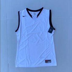 Nike Men's Team Enferno Basketball Jersey Sleeveless Tank Shirt Dri-Fit Sleeveless Jersey With Contrast Arm Bandand Neck Band Flatback Mesh Fabrication Withopen Holed Mesh Back Panel For Enhanced Breathability Sleeveless Color: White And Black Casual White Sports Vest, Nike Sleeveless Tank Top For Sports, Nike Sleeveless Tops For Summer, Nike Sleeveless Summer Tops, Nike Sporty Sleeveless Tops, Nike Black Sleeveless Top, Nike Sporty Sleeveless Vest, White Cotton Sports Vest, Sporty Sleeveless Nike Top