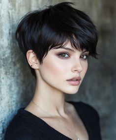 Incorporate soft waves into your pixie bob for a more relaxed and feminine look. The waves add movement and texture, making this style perfect for casual wear or special occasions. Emilia Clarke Pixie Hair, Feminine Long Pixie Haircut, Wavy Pixie Bob, Boyish Haircut For Women, Asian Woman Pixie Haircut, Emilia Clarke Pixie, Feminine Pixie Cut, Waves For Short Hair, Pixi Hair 2024