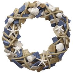 a wreath made out of wood and rope with seashells on the top, along with starfish