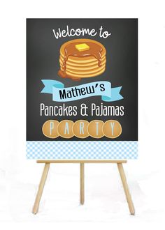 a sign that says welcome to matheur's pancakes and pajamas party on it