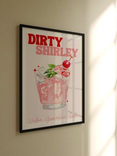 a framed poster hangs on the wall next to a window that reads dirty shirley