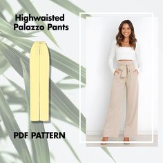 a woman wearing high waisted pajama pants and white top with palm leaves in the background