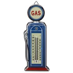 an old fashioned gas pump with thermometer on top