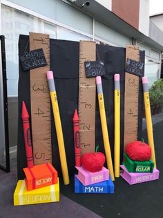 the growth chart is made out of cardboard and crayons with markers on them