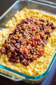 a casserole dish with beans, corn and ground beef