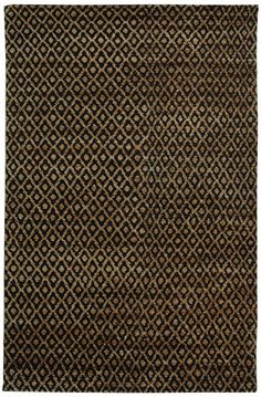 a brown and black rug with an intricate design on the bottom, it is shown