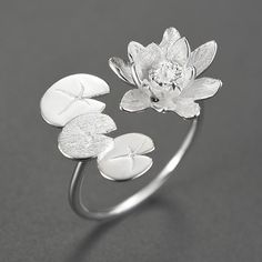 Whether you're seeking a meaningful gift for a loved one or looking to express your own connection to nature and spiritual growth, our Sterling Silver and Gold Lotus Flower and Lily Pads Ring is the perfect choice. It embodies the beauty and symbolism of these iconic elements, reminding us to embrace the serenity and beauty that surround us. Item Weight: about 2.6g Metals Type: Silver Metal Stamp: 925,Sterling Main Stone: NONE Fine or Fashion: Fine Setting Type: None Side Stone: None Item Type: Water Lily Ring, Lotus Flower Jewelry, Water Lily Flower, Lotus Flower Ring, Lily Ring, Gold Lotus, Silver Water, Animal Rings, Water Lily