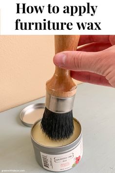 a hand holding a brush over a paint can with the words how to apply wax to chalky paint