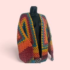 Custom rainbow Granny square cardigan. Available in custom colors Trendy Multicolor Open Front Cardigan, Colorful One Size Fall Cardigan, Colorful One Size Cardigan For Fall, Multicolor Retro Knitted Outerwear, Multicolor Knit Cardigan One Size, One Size Multicolor Knit Cardigan, Handmade Multicolor Casual Outerwear, Multicolor Open Front Fall Sweater, Multicolor Open Front Sweater For Fall