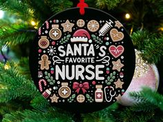 santa's favorite nurse ornament hanging from a christmas tree with ornaments around it