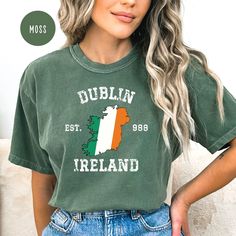 Dublin Ireland Grunge Style Comfort Colors® T-Shirt, Dublin Vacation Gift Shirt, Ireland Travel Shirt, Ireland Flag Tee, Ireland Gift Shirt. Orders are processed within 24 hours and shipped out within 2 to 5 business days. What you receive Comfort Colors® Adult Unisex Crewneck T-shirt Color Choices: Ivory Bay Berry Light Green Mustard Blue Jean Blue Spruce Pepper Moss Sizes: Unisex adult sizing use size chart as a guide. These shirts are fitted and run true to size. If you prefer a loose fit go Green Graphic Print Top For College, Fan Apparel Slogan Crew Neck Top, Slogan Crew Neck Top For Fans, Green Letter Print Top For Fans, Green Letter Print Top For College, Green Crew Neck Top For College, Fan Apparel Slogan Top, Soft-washed Crew Neck T-shirt For Fans, Soft-washed Crew Neck T-shirt For College