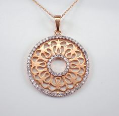 "14K Rose Gold Diamond Mandala Pendant Necklace with Chain. This pendant is set with seventy-two genuine natural round brilliant diamonds. These diamonds are G color, SI clarity and weigh a total of .42 carat. This pendant is 14KT Rose Gold and comes with an 18\" 14KT Rose Gold chain. Both the pendant and chain weigh a total of 3.2 grams and the pendant measures 22 mm in diameter. This necklace will be accompanied by an appraisal written by a GIA Certified Diamond Grader with the retail replacement value of $1,579.00. I will ship this necklace promptly in a beautiful gift box. ADDITIONAL REQUESTS If you would like to see more pictures of this item, please let us know and we would be happy to provide them for you. Please contact us with all questions, we are here to help." Rose Gold Hallmarked Diamond Necklace For Anniversary, Anniversary Rose Gold Diamond Necklace Hallmarked, Rose Gold Diamond Necklace With Rose Cut Diamonds, Round Rose Gold Necklace With Rose Cut Diamonds, Rose Gold Diamond Necklace With Rose Cut, Round Rose Cut Diamond Necklace, Diamond Mandala, Mandala Pendant, Rose Gold Circle