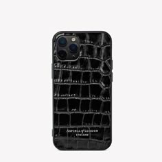 an iphone case with black alligator skin on the front and back cover, showing it's logo