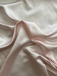 Light Pink Satin Fabric By The Yard, By The Half Yard- 60" Wide This beautiful taupe satin is perfect for making bedding, dresses and much more! Color is a light pink. Great quality satin. I am selling this fabric by the yard and by the half yard. Fabric width is 60". If purchasing 1 yard- measurement will be 60"W x 36"L. If purchasing 1/2 yard piece- measurement is 60"W x 18"L. If you would like more than one yard, please mark how many yards you would like in the quantity box during check out. Helena Costume, Super Light Pink, Cloth Reference, Pink Satin Fabric, Powder Blue Color, Dark Water, Romantic Academia, Baby Pink Colour, Vintage Lady