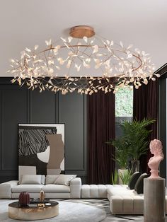 a living room with a large chandelier hanging from the ceiling